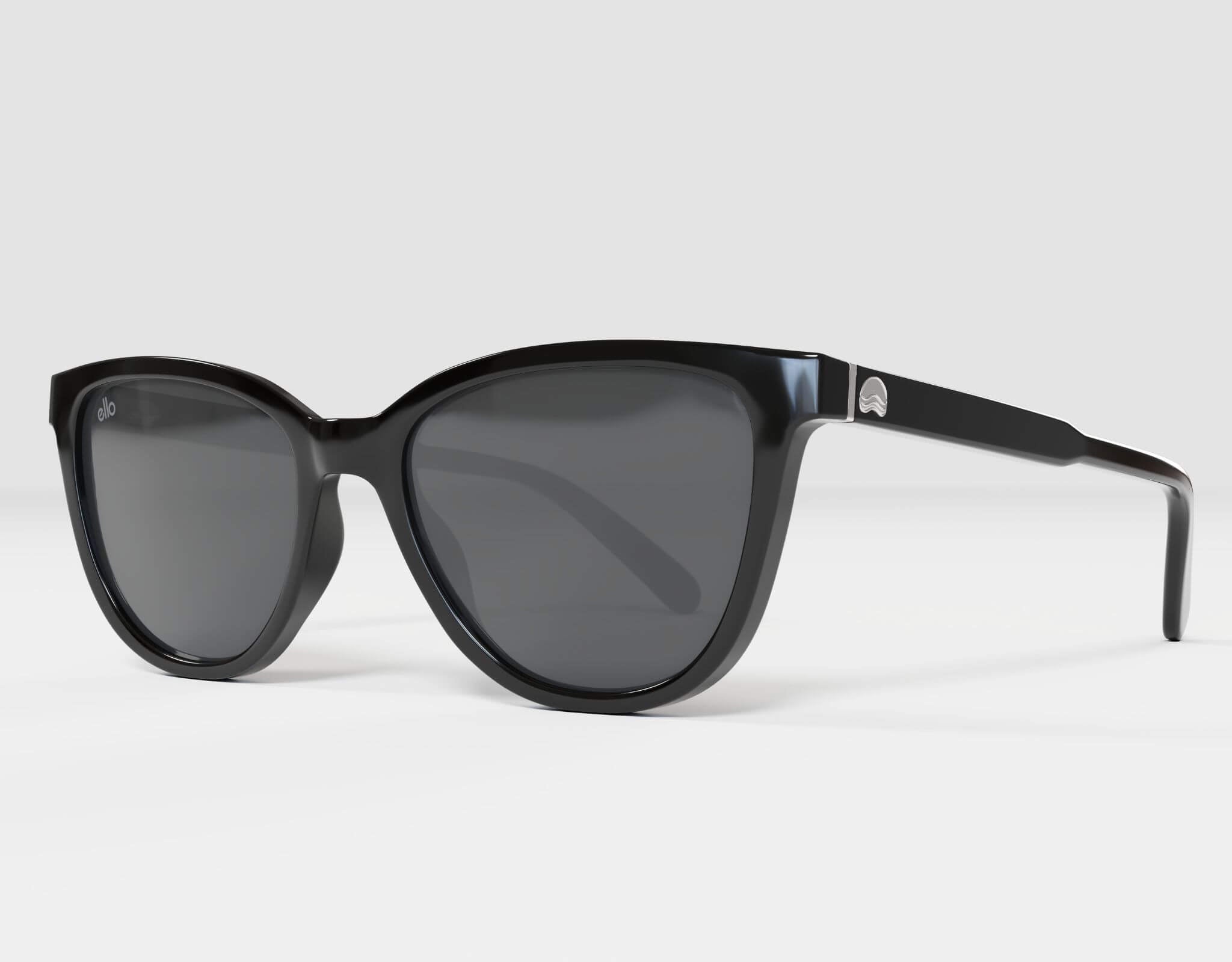 Side profile of Half Moon Bay cat eye sunglasses in glossy black with black lenses, crafted for smaller faces.