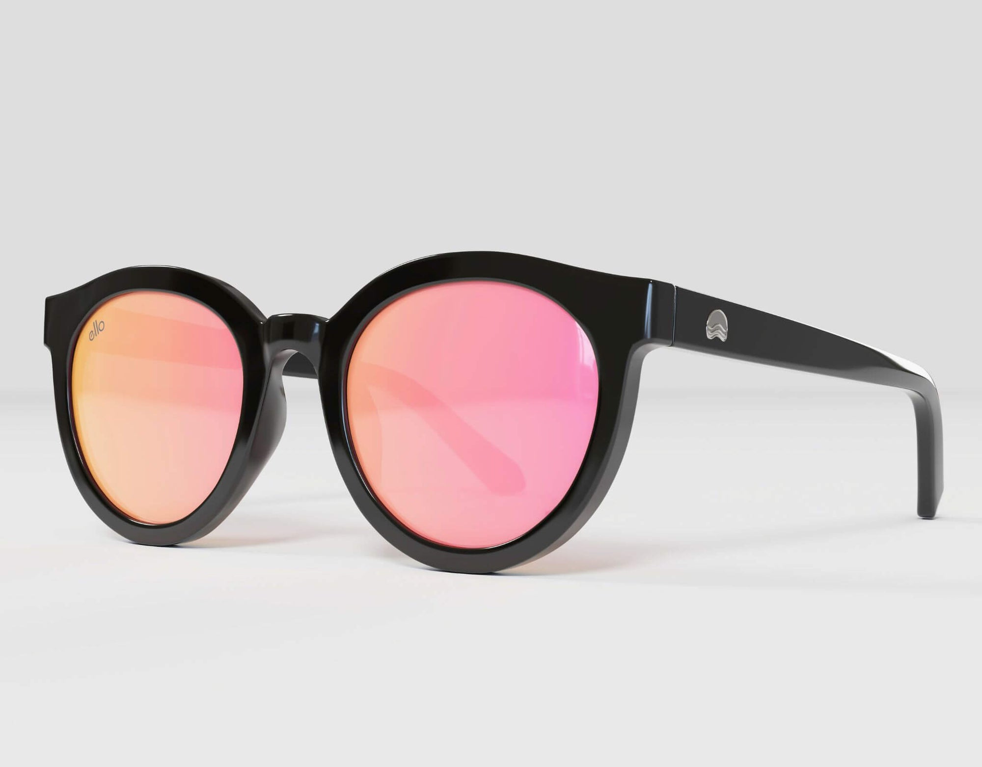 Side view of black frame Bar Harbor sunglasses with pink lenses, perfect for small faces.