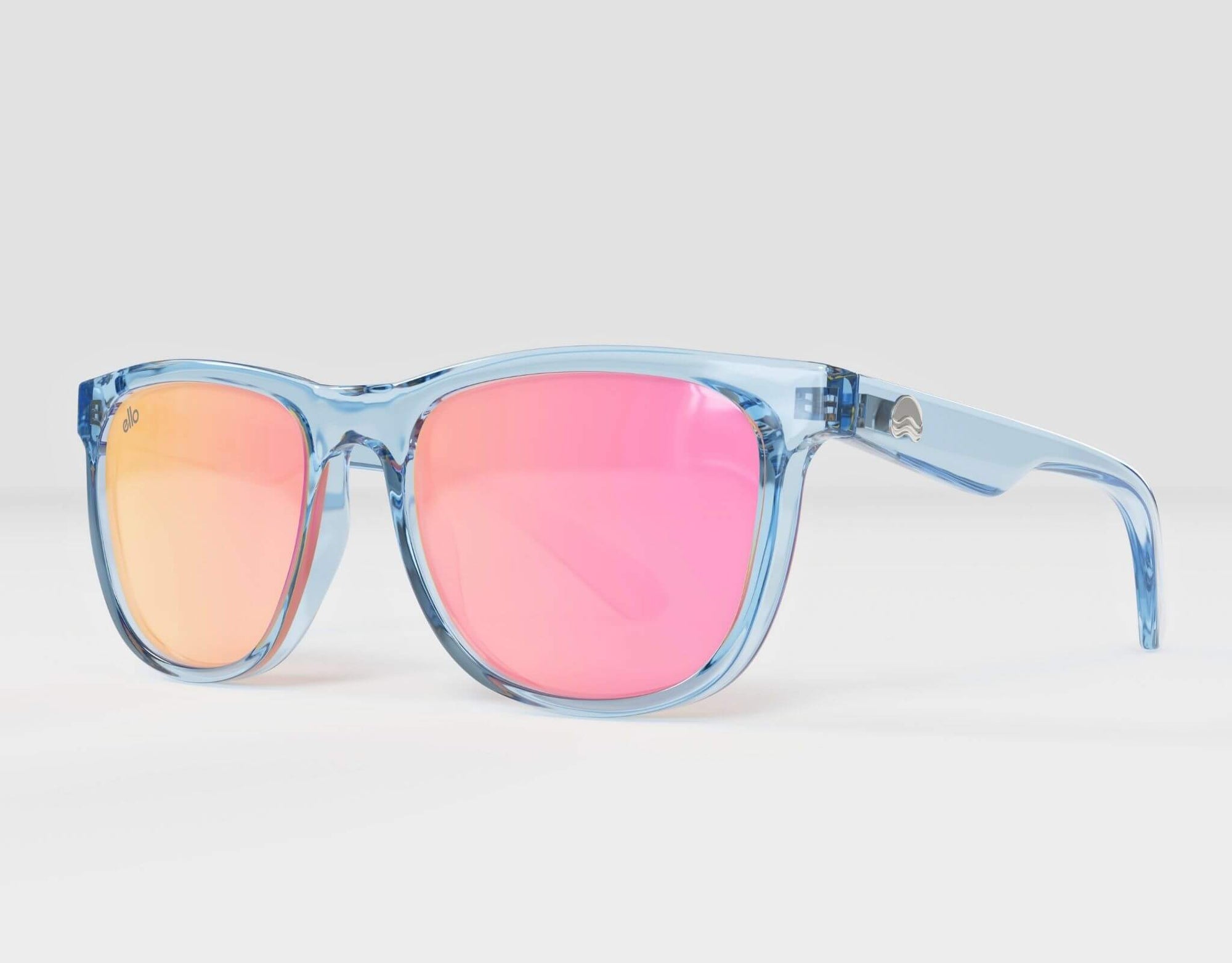 Side view of Outer Banks sunglasses in sporty blue frame with pink lenses, made for small faces.