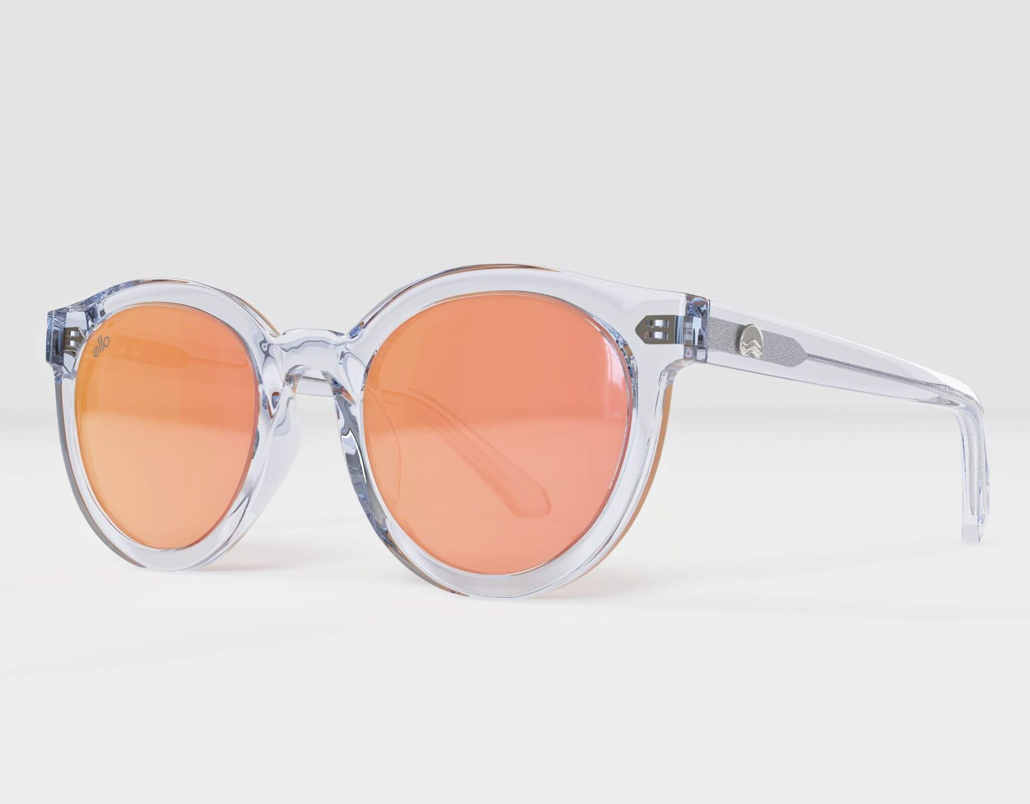 Side view of Bar Harbor clear frame sunglasses with peach mirror lenses for small faces.