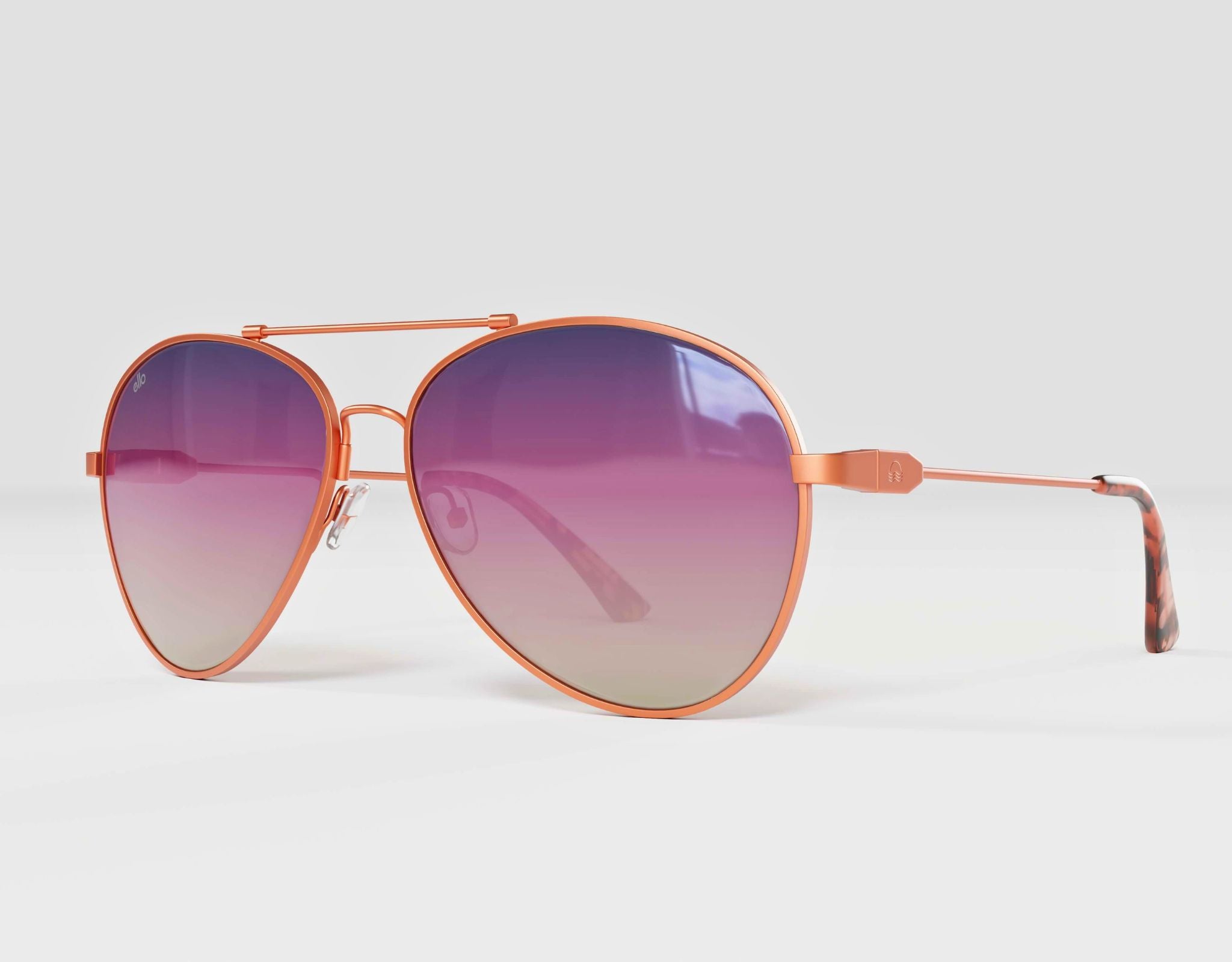 Left side view of Bali aviator sunglasses in gold with lavender lenses, made for small face.