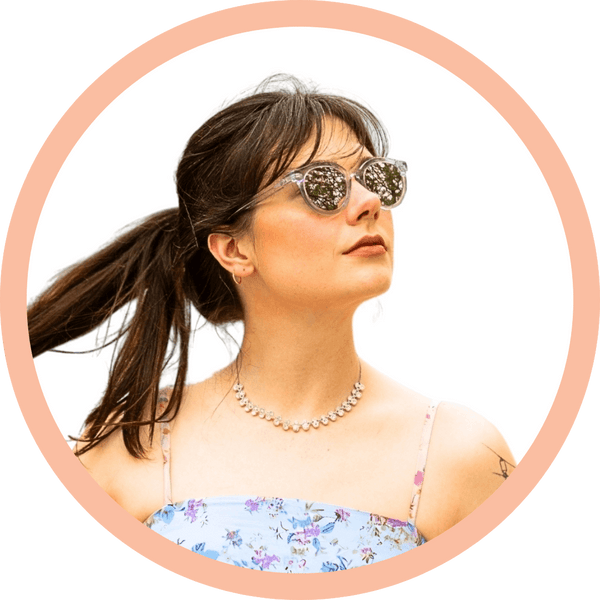 Woman wearing petite-fit sunglasses with sleek, balanced proportions—no more oversized frames.