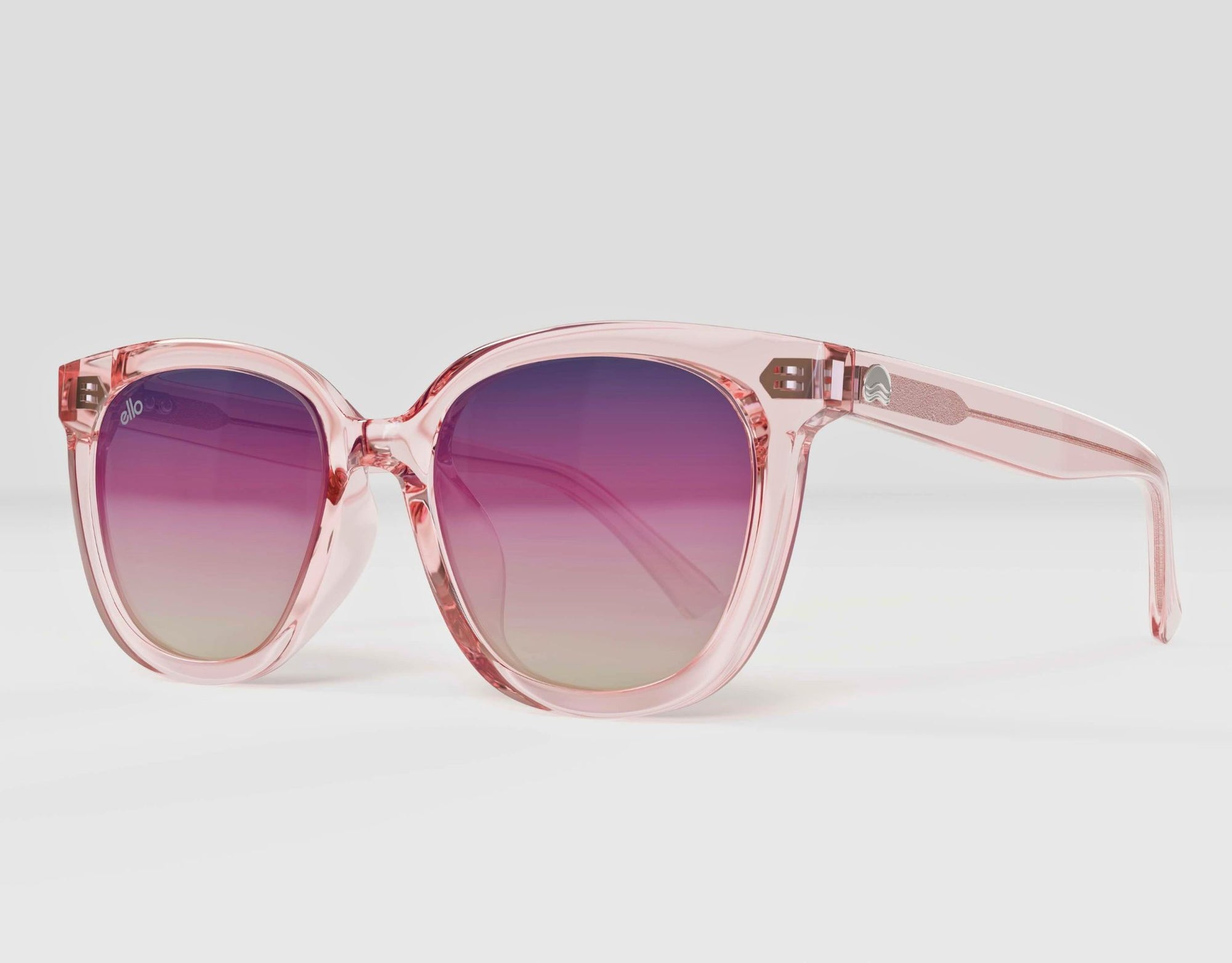 Left side view of Pebble Beach frame in pink with bold lavender lenses, sunglasses designed for little faces.