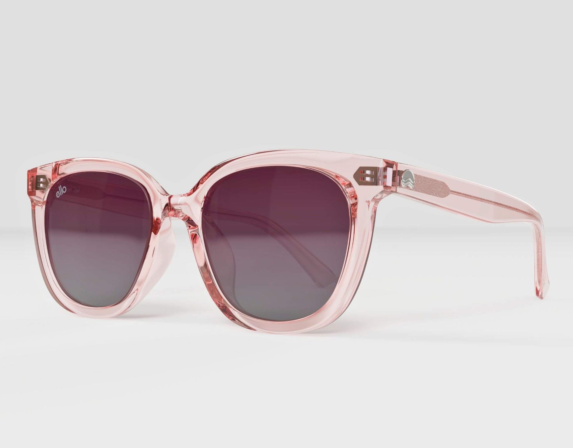Side view of Pebble Beach sunglasses in soft pink frame with matching plum lenses, made for little faces.