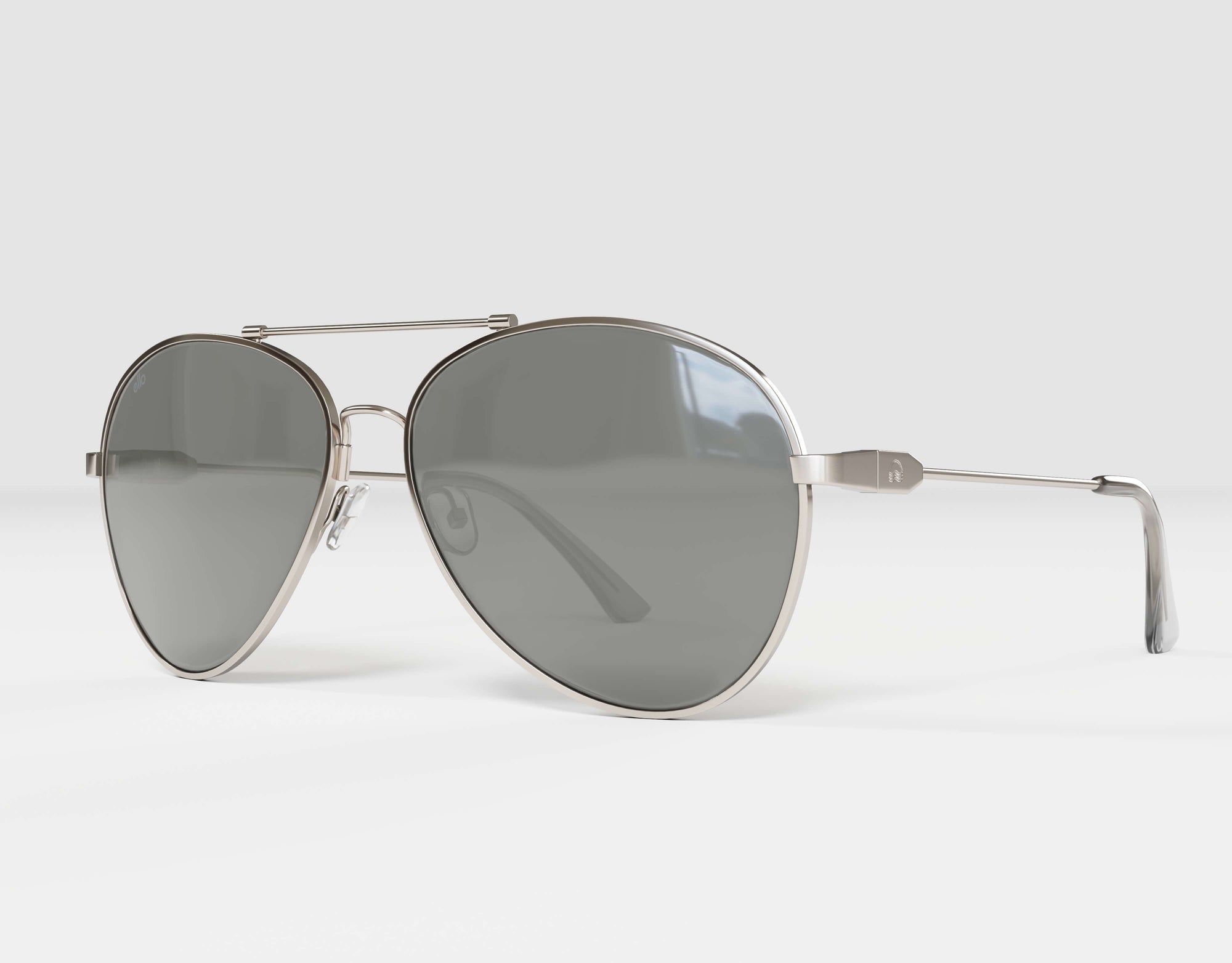 Left side view of silver Bali aviator sunglasses with grey lenses, built for small face shapes.