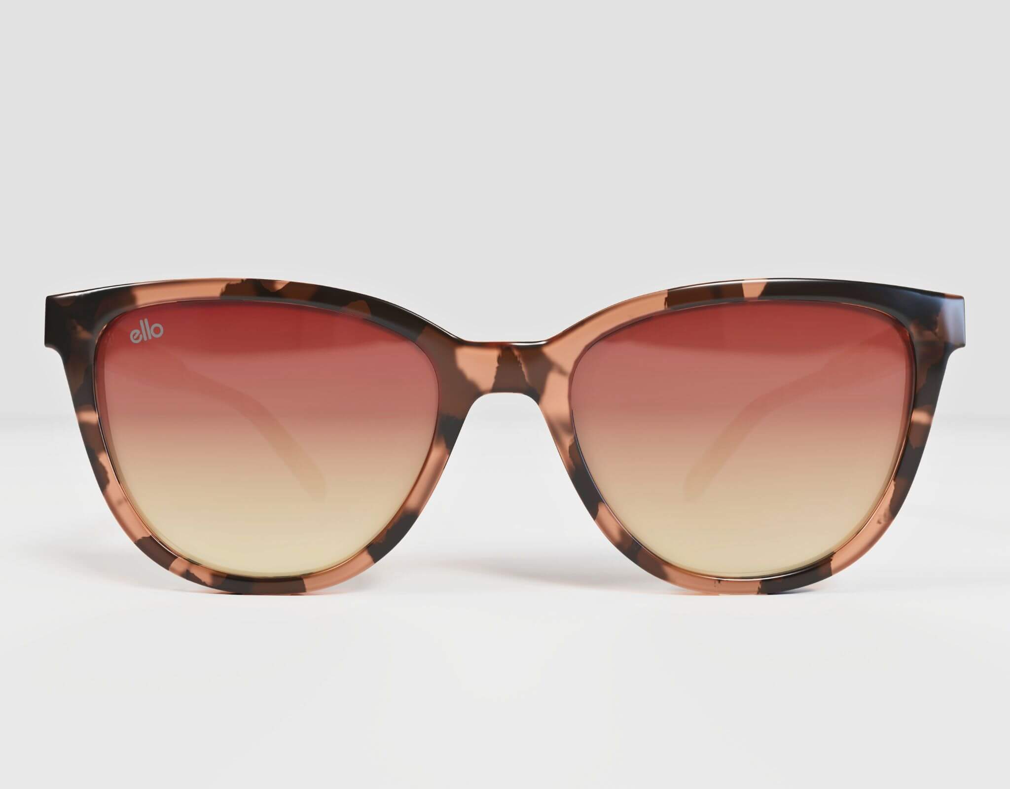 Front view of Half Moon Bay cat eye sunglasses in tortoise with warm amber lenses, fitting petite profiles.