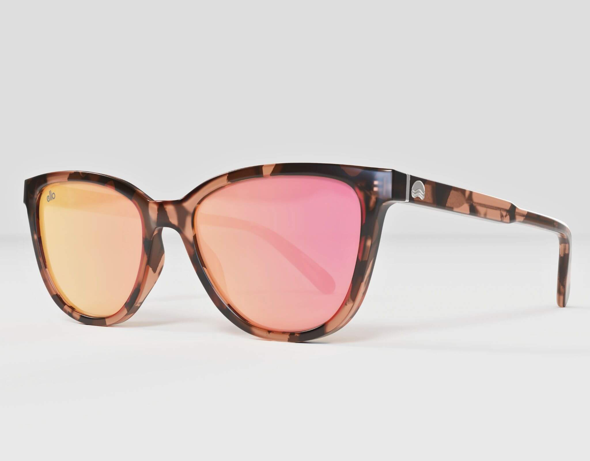 Side angle of Half Moon Bay sunglasses in tortoise frame with rose-pink lenses, ideal for smaller faces.